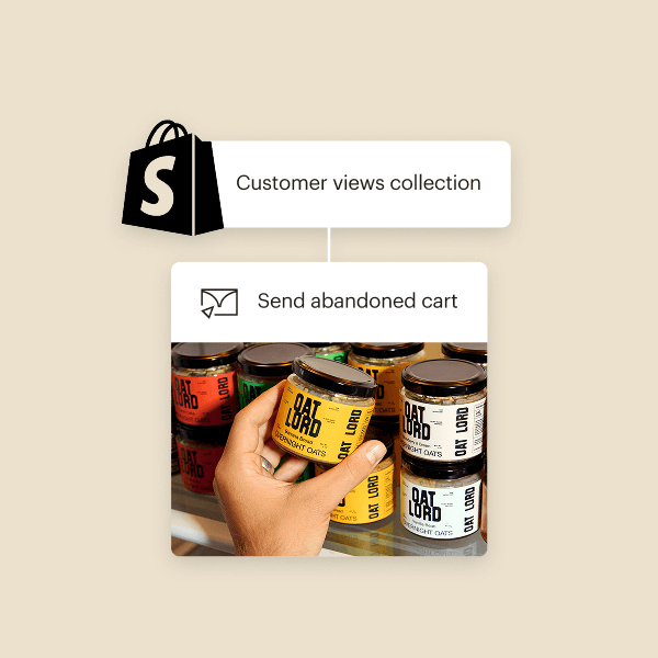 Shopify logo with two connected workflow steps: “Customer views collection” triggers “Send abandoned cart” action, shown with a product photo of colorful jars of overnights oats from fictitious brand, Oat Lord.